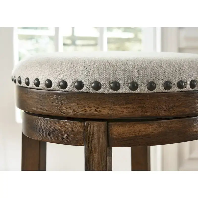 Tabouret de bar pivotant rustique-industriel avec garniture cloutée